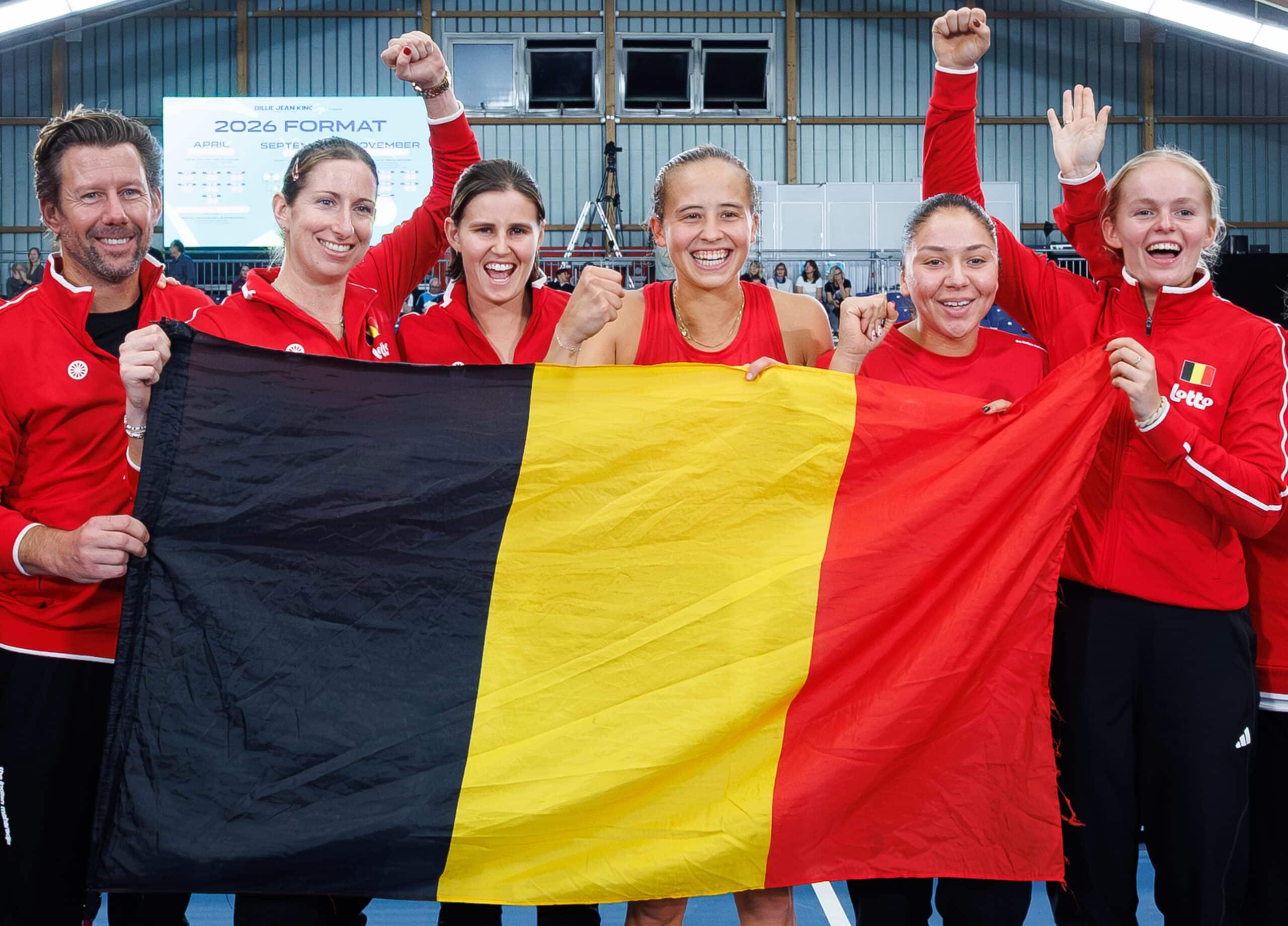 Belgian team captain Wim Fissette, Magali Kempen, Greet Minnen, Hanne Vandewinkel, Sofia Costoulas and Jeline Vandromme celebrate after a tennis match between Belgian Vandewinkel and German Seidel, the second match of the meeting between Belgium and Germany in the Billie Jean King Cup Play-offs, on Sunday 16 November 2025 in Ismaning, Germany. PHOTO BENOIT DOPPAGNE